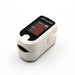 Finger pulse oximeter with digital display on a white background