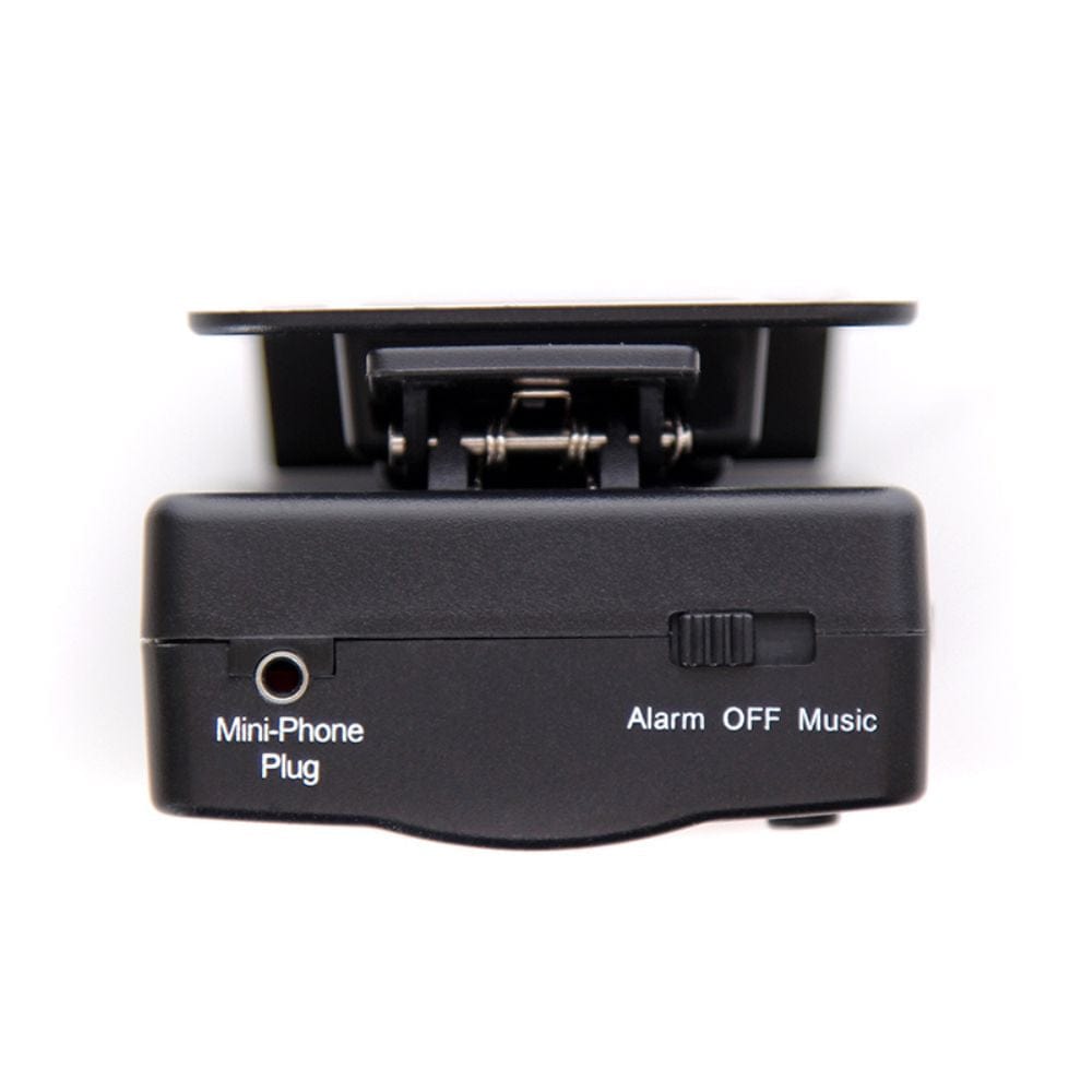 Black electronic device with 'Mini-Phone Plug' and 'Alarm OFF Music' labels on a white background