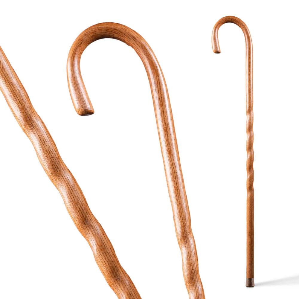 Two wooden walking canes on a white background