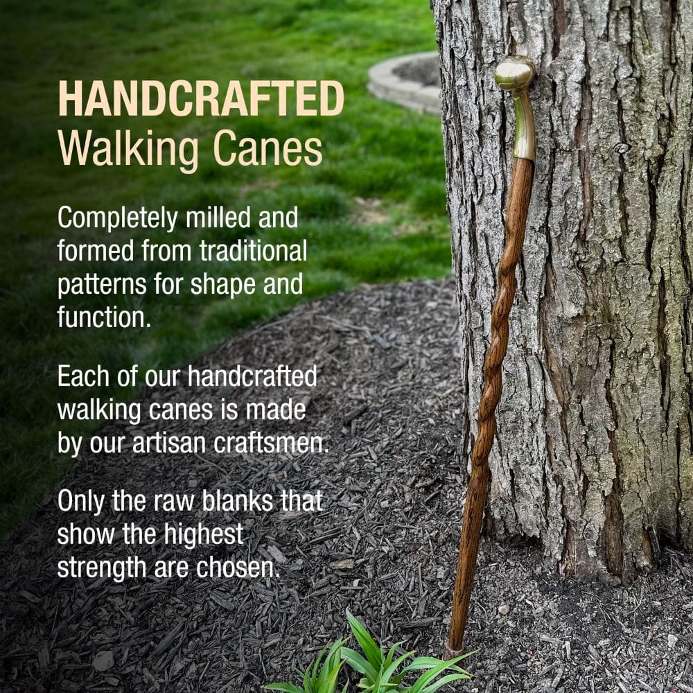 Handcrafted walking cane leaning against a tree with promotional text about its traditional craftsmanship.
