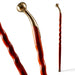 Two walking canes with gold tops on a white background