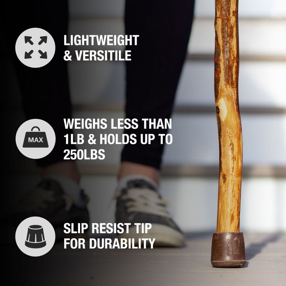 Wooden walking stick with text highlighting features on a blurred background