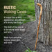 Rustic walking cane leaning against a tree with descriptive text about its features.