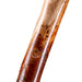 Close-up of a wooden cane handle on a white background