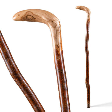 Two wooden walking canes on a white background