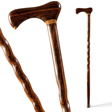 Two wooden walking canes on a white background