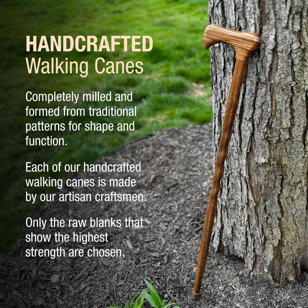 Handcrafted walking cane leaning against a tree with promotional text about its traditional craftsmanship.