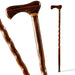 Two wooden walking canes on a white background