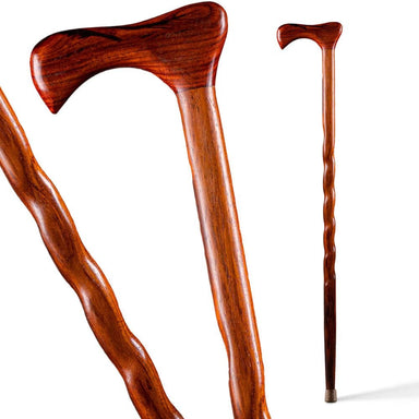 Wooden walking cane with a detailed handle on a white background