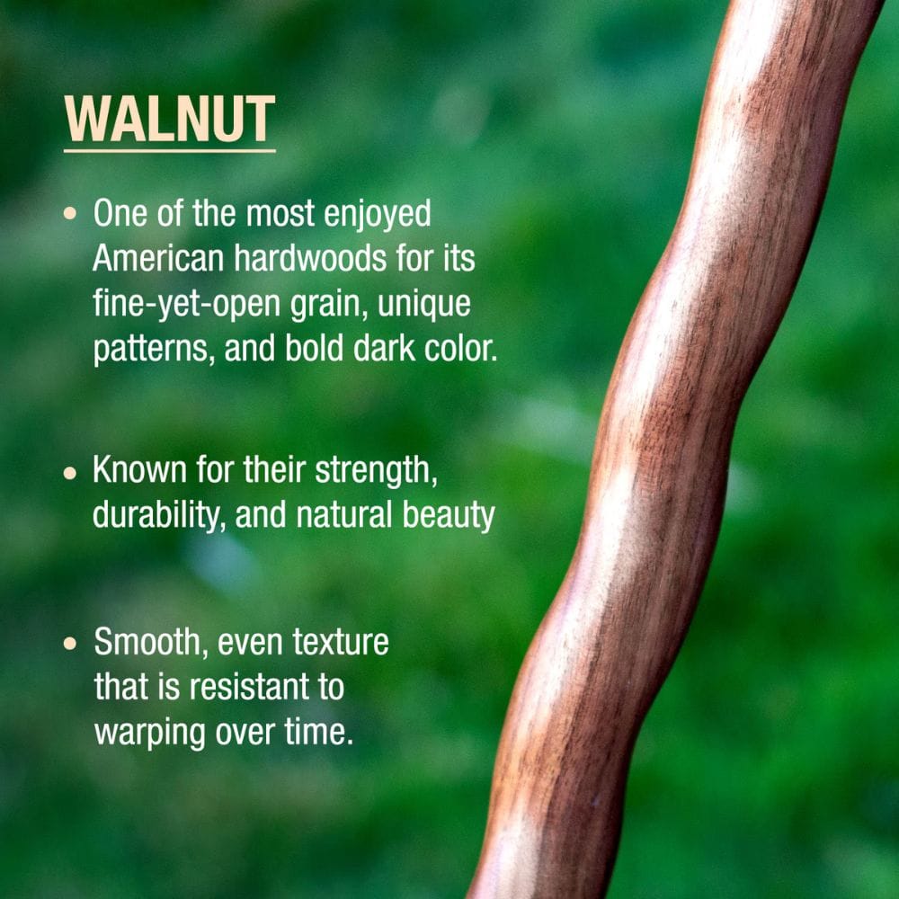 Wooden stick with text about walnut wood on a blurred green background
