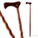 Two wooden walking canes on a white background