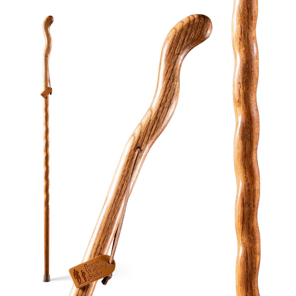 Three wooden walking sticks with a brand label on a white background
