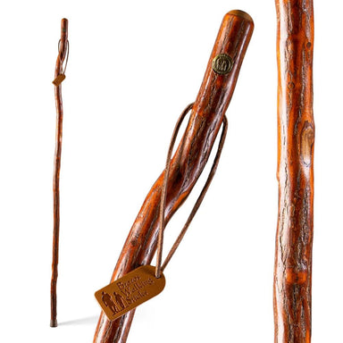 Wooden walking stick with a branded tag on a white background