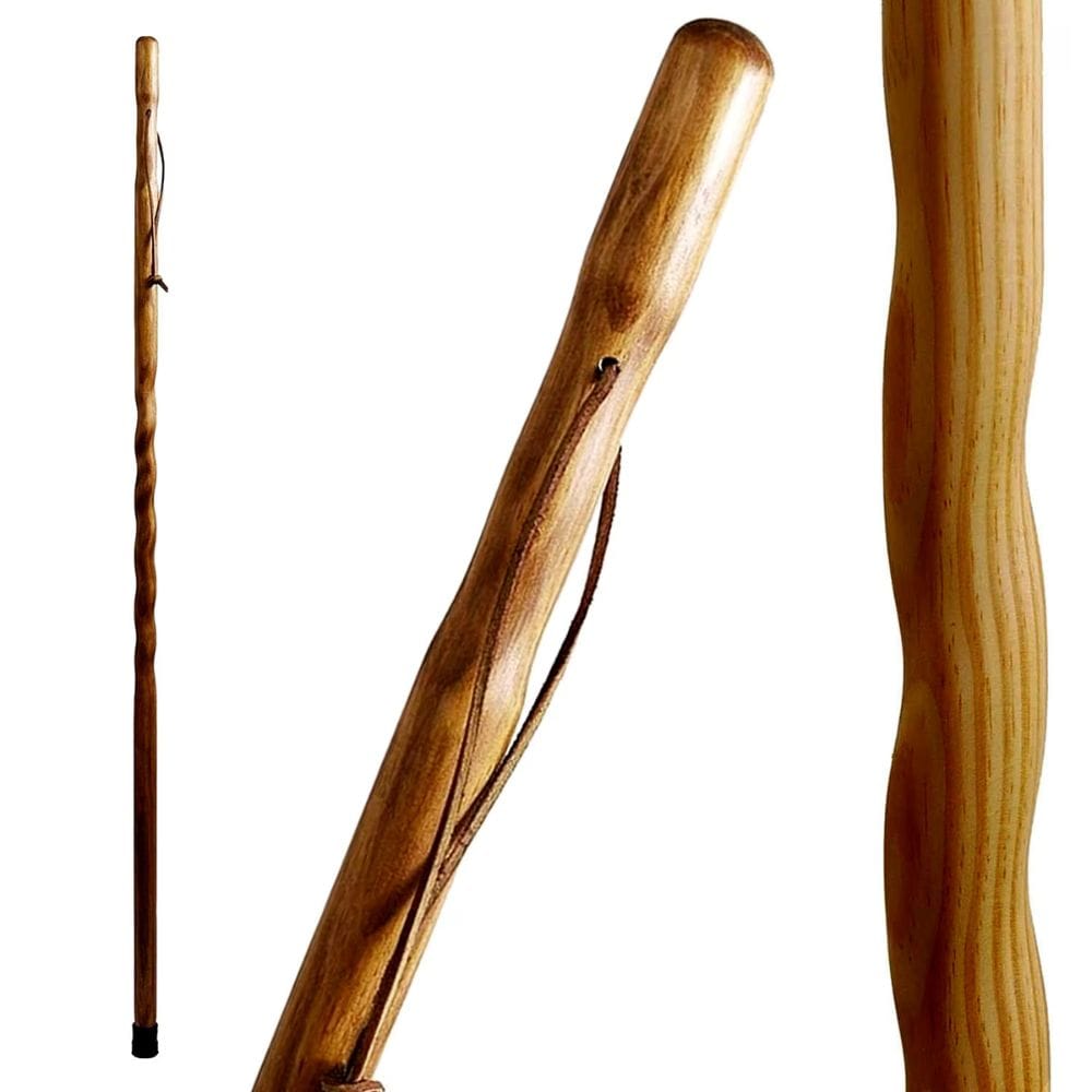 Three wooden walking sticks of different designs on a white background