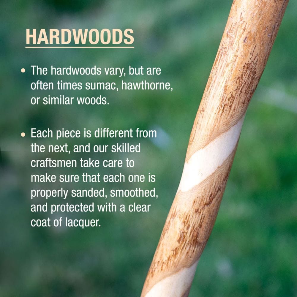 Close-up of a wooden stick with text about hardwoods on a blurred green background