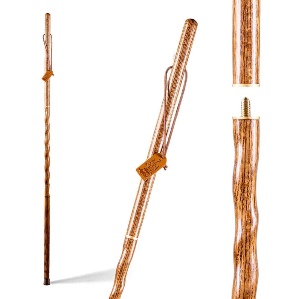 Wooden walking stick with a textured handle on a white background