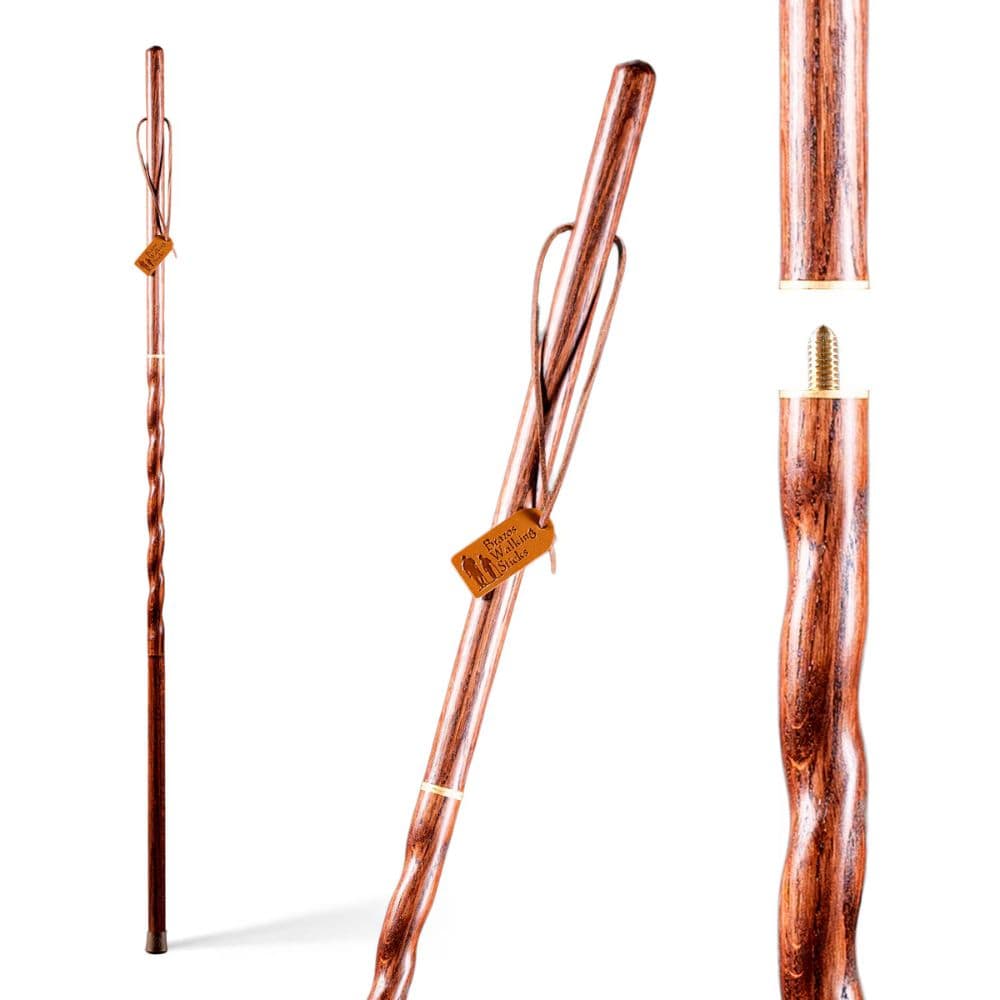 Wooden walking stick with a textured handle on a white background