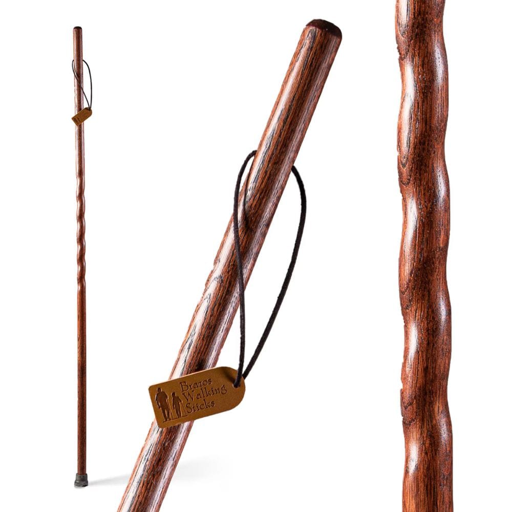 Wooden walking stick with a brand tag on a white background