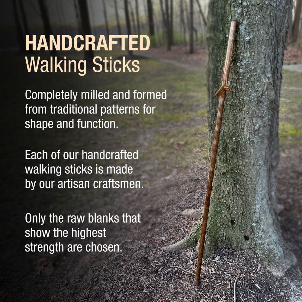 Handcrafted walking stick leaning against a tree in a forest setting with promotional text.