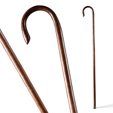 Three wooden walking sticks with curved handles on a white background