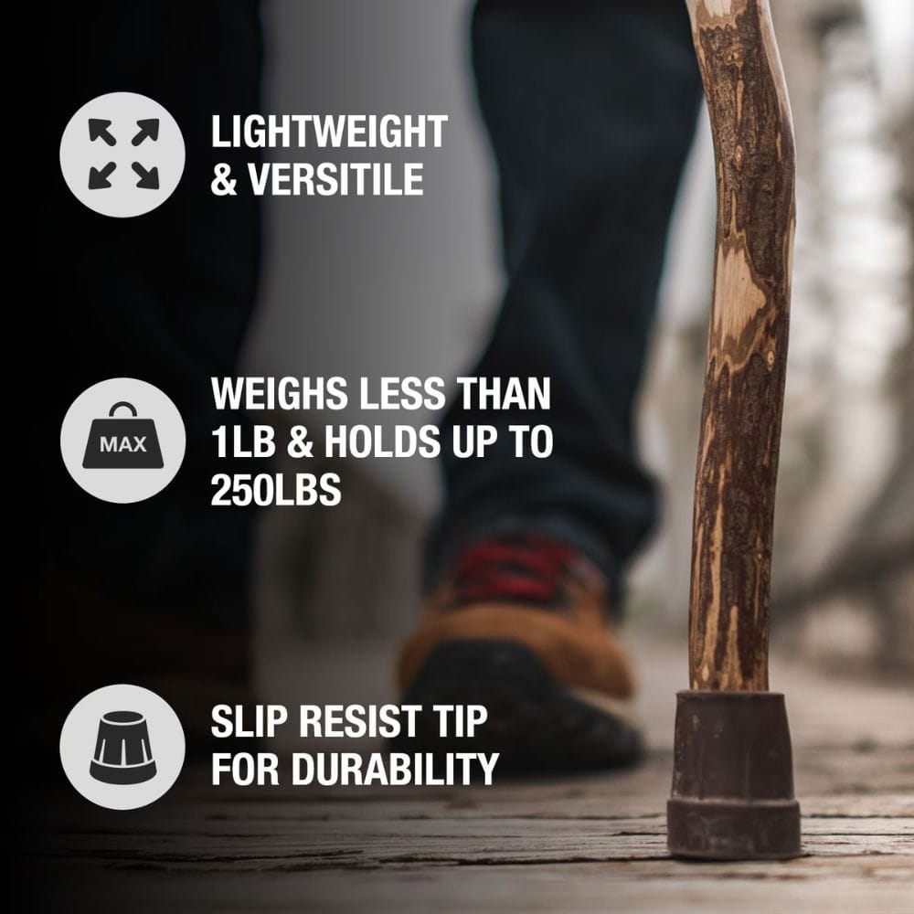 Wooden walking stick with text highlighting features on a blurred background of a person walking.