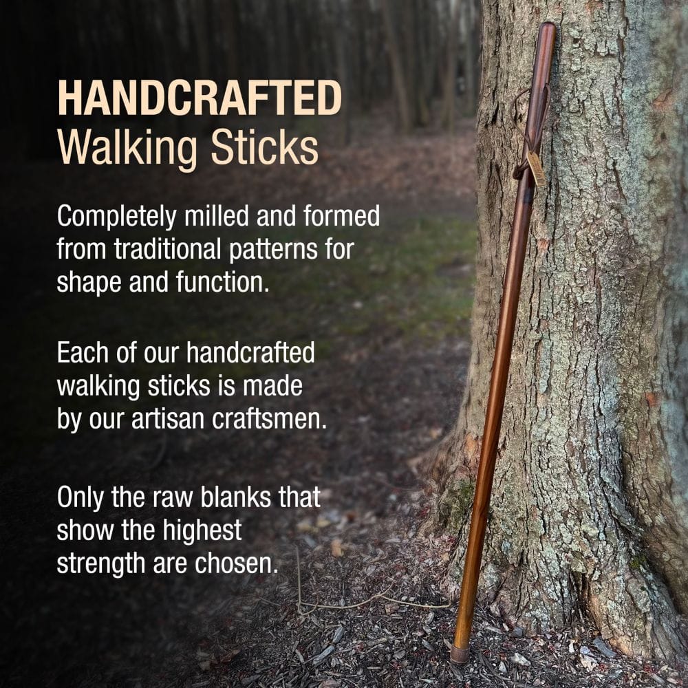 Handcrafted walking stick leaning against a tree with promotional text about traditional patterns and artisan craftsmanship.