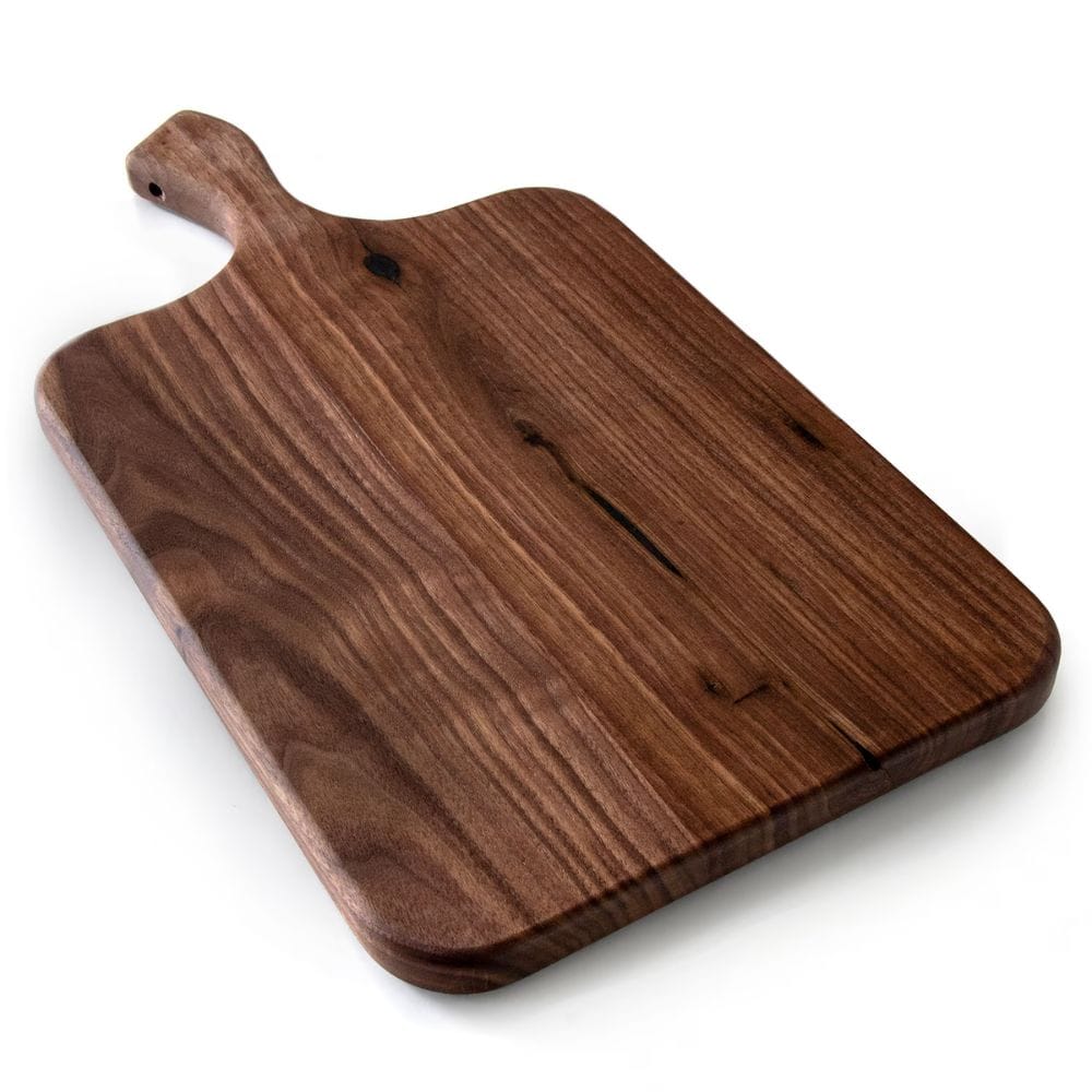Wooden cutting board with a handle on a white background