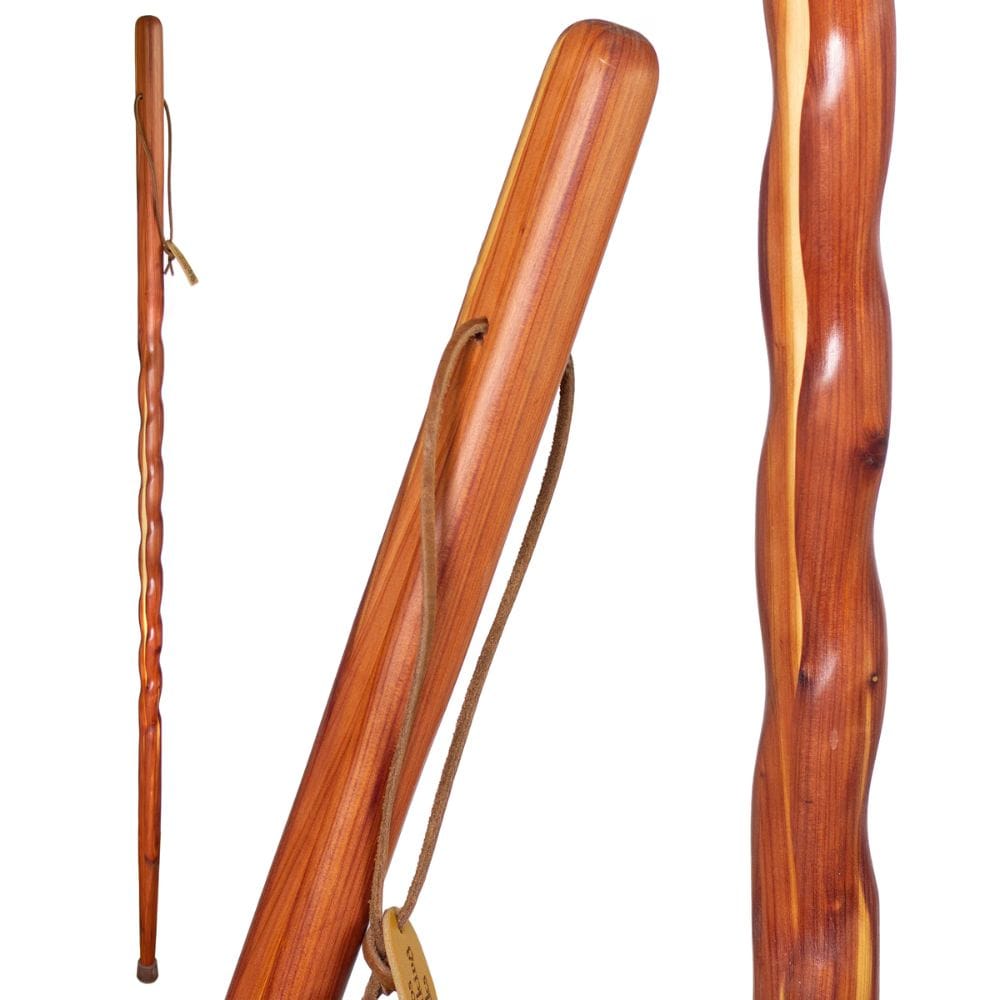Three wooden walking sticks with a white background