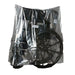 Black wheelchair partially covered with clear plastic wrap on a white background