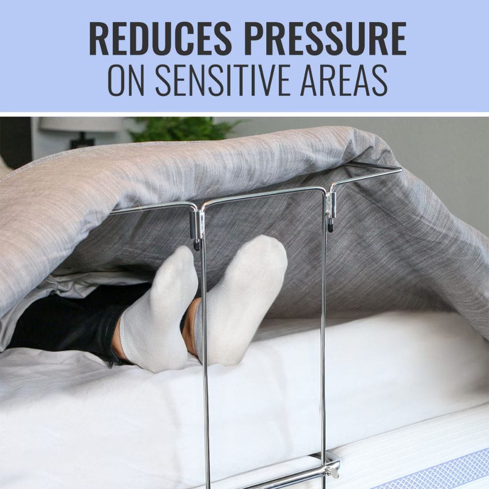 Person lying on a bed with a clear plastic cover over them, text 'Reduces pressure on sensitive areas' above.