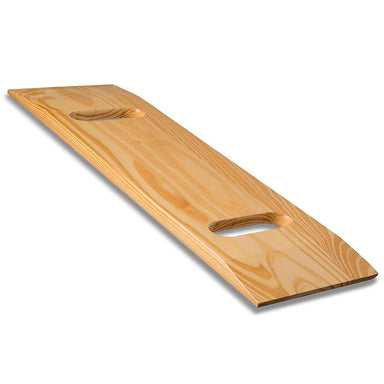 Wooden paddle with two holes on a white background