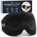Black contoured sleep mask with DMI branding and packaging in the background.