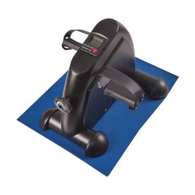 Black exercise bike with digital display on a blue mat