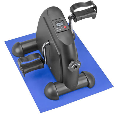 Black exercise bike on a blue mat with digital display