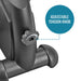 Close-up of an adjustable tension knob on a piece of exercise equipment with a blue label indicating its function.
