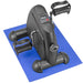 Black exercise bike on a blue mat with digital display