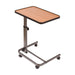 Adjustable height table with wooden top and metal frame on a white background
