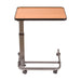 Adjustable height desk with wooden top and metal frame on a white background