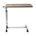 Adjustable overbed table with wooden top and metal frame on a white background