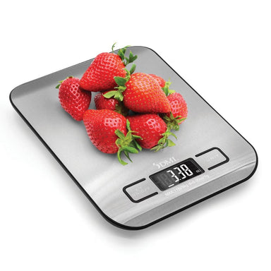 Digital kitchen scale with strawberries on a white background