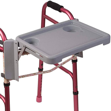 Red walker with a gray tray attached on a white background
