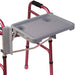 Red walker with a gray tray attached on a white background