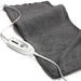 Gray heating pad with digital controller on a white background