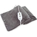 Gray electric heating pad with a white power cord on a white background