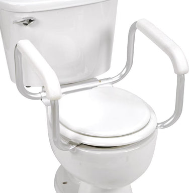 White toilet with a seat and armrests on a white background