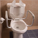 Toilet with a raised seat and grab bars in a bathroom setting.