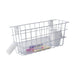 White wire storage basket with stationery items on a white background