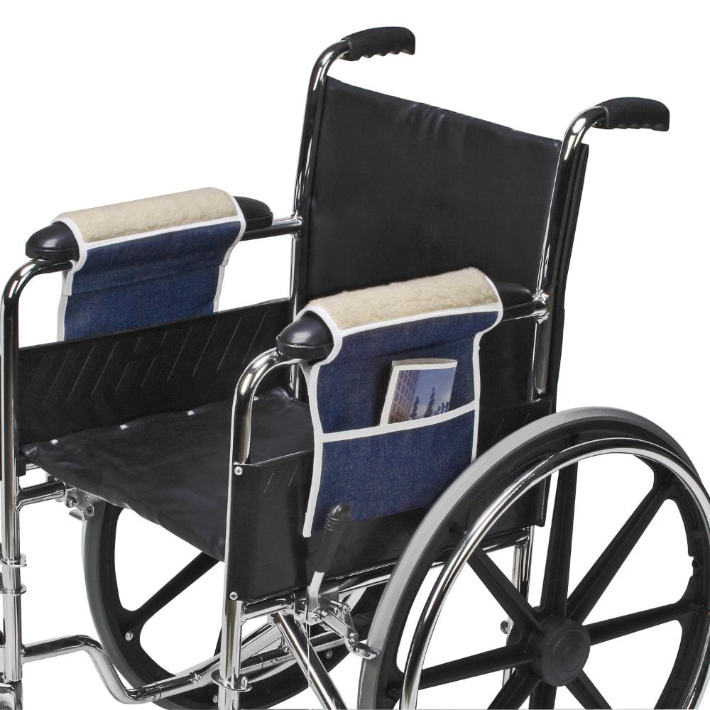 Wheelchair with a blue seat cover and magazine pocket on a white background