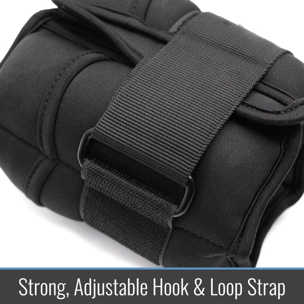 Black padded wrist support with a strong, adjustable hook & loop strap on a white background.