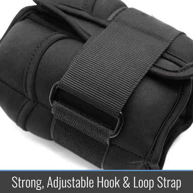 Black padded wrist support with a strong, adjustable hook & loop strap on a white background.